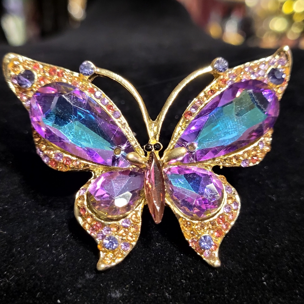Fashion Butterfly Goldtone Brooch with Purple and Violet Rhinestones .